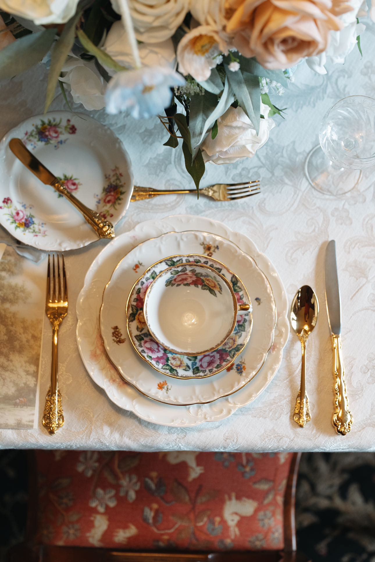 wedding reception place setting with antique china